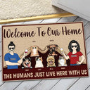 The Humans Just Live Here Couple With Pets - Personalized Custom Doormat