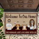 The Humans Just Live Here Couple With Pets - Personalized Custom Doormat